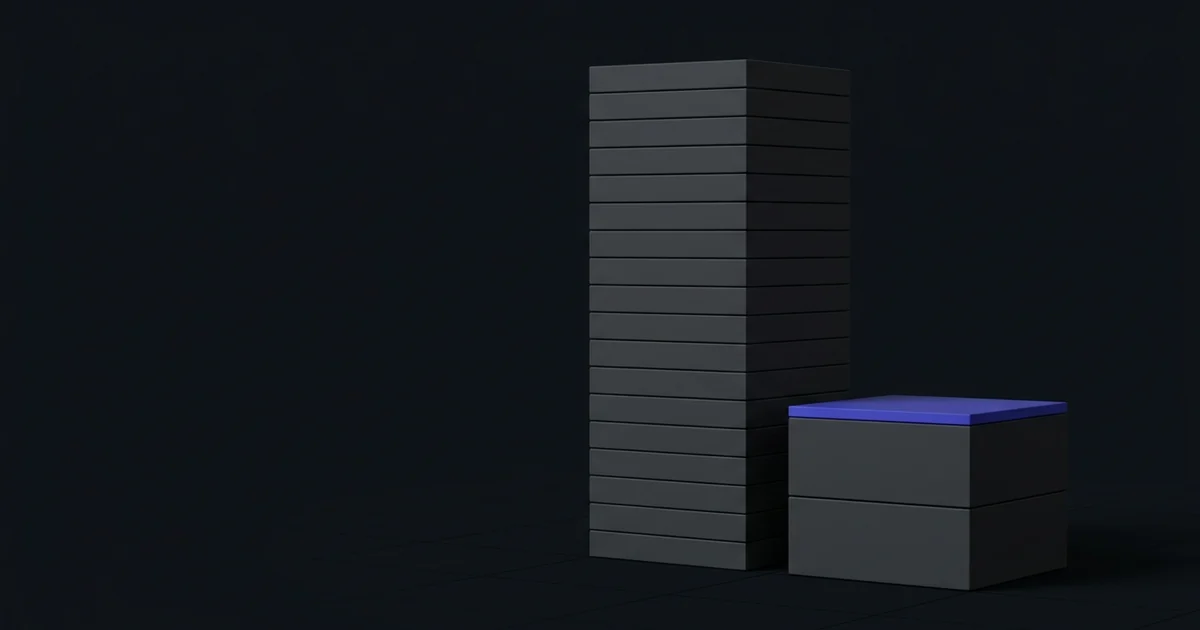 A tall stack of dark blocks beside a stack only two blocks high